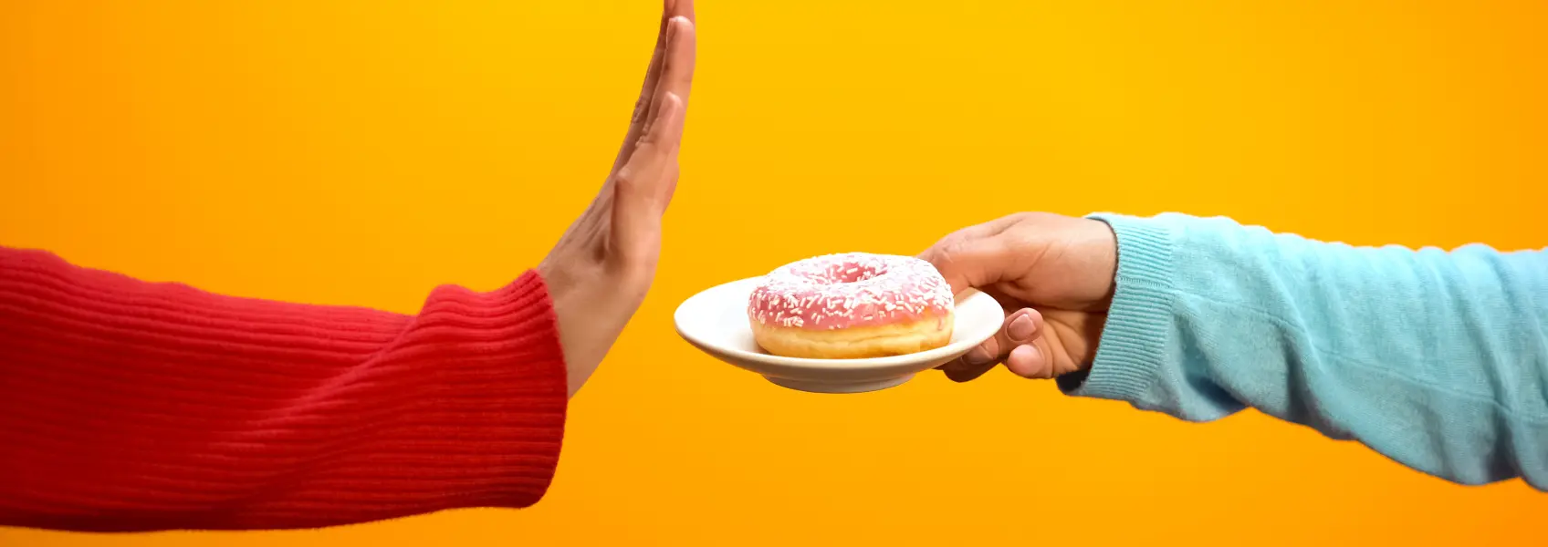 pessoa a rejeitar um donut
