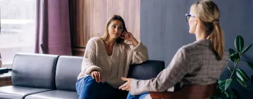 mulher em consulta de psicoterapia