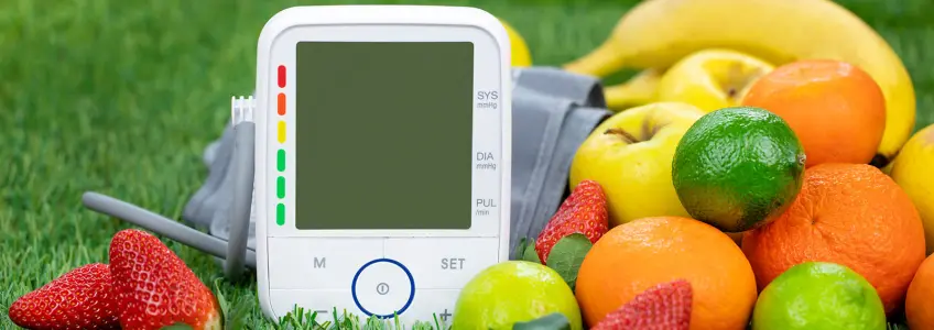 medidor de tensão disposto junto a frutos diversos