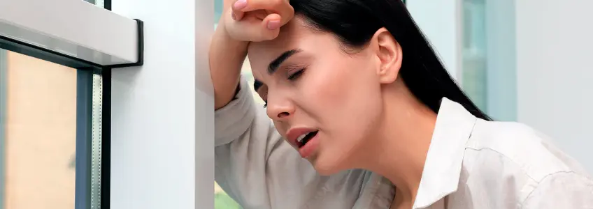 mulher com tonturas