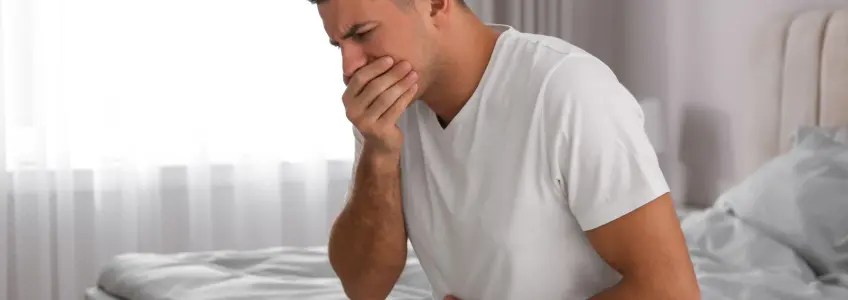 homem a sentir náuseas